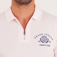 Polo col zippé en maille fantaisie cloquée