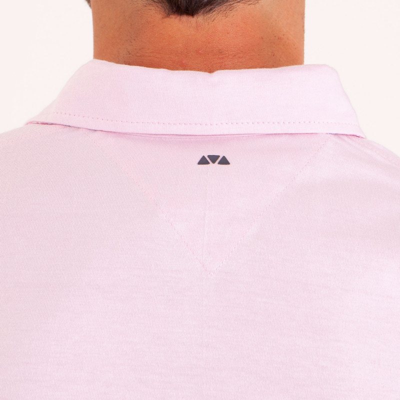 Polo uni détails col et broderies poitrine
