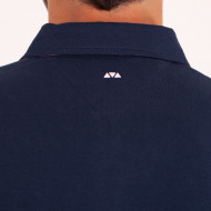 Polo uni détails col et broderies poitrine