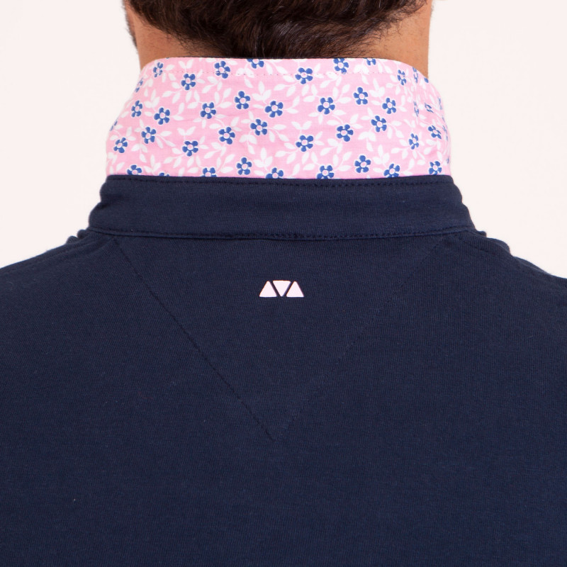 Polo uni détails col et broderies poitrine