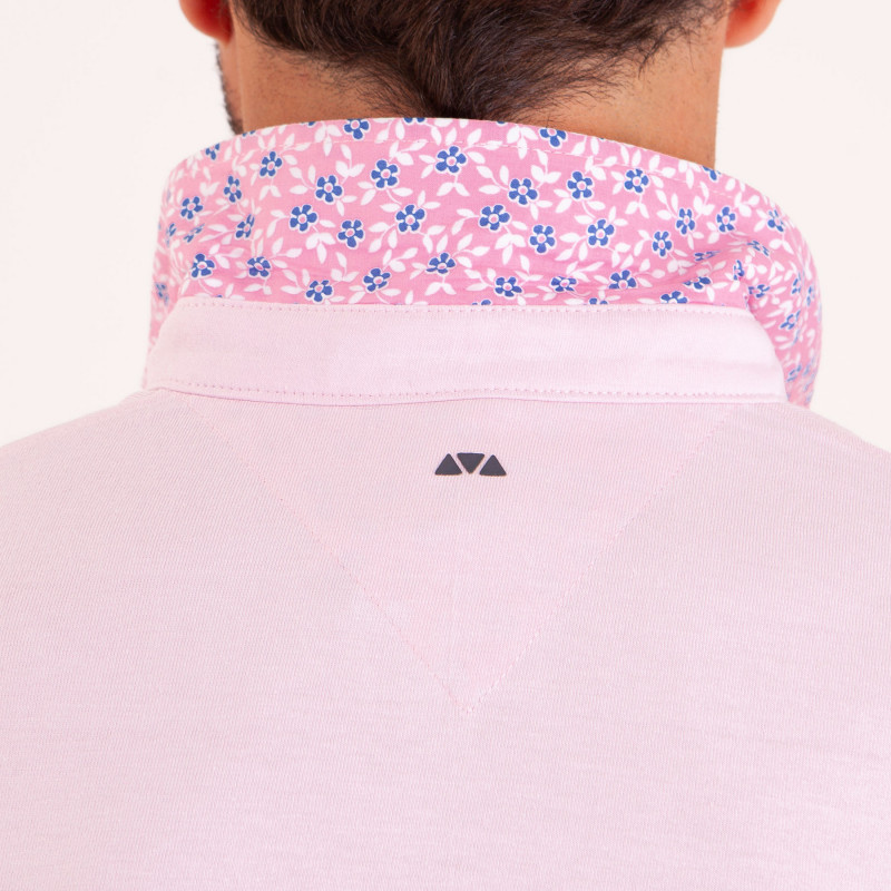Polo uni détails col et broderies poitrine
