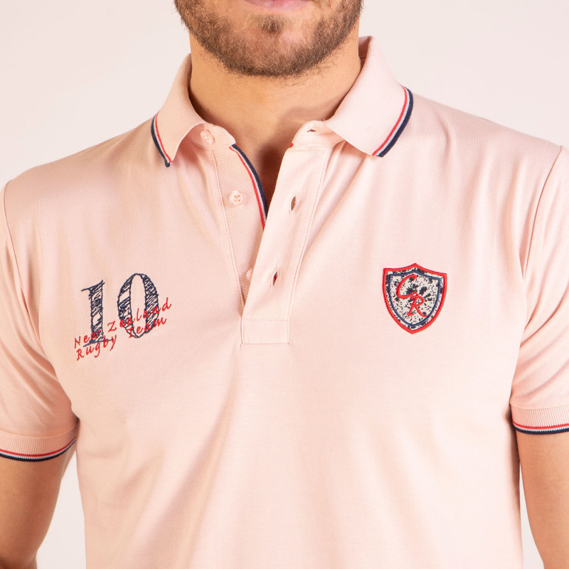 Maillot à manches courtes orné de broderies sur la poitrine
