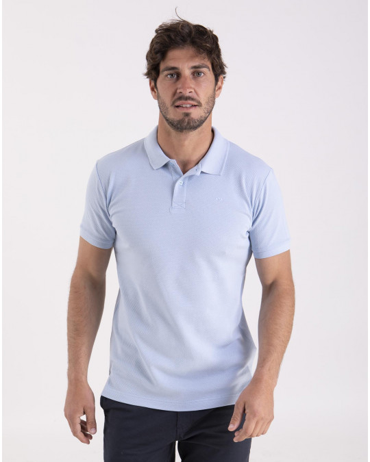 Polo uni en maille cloquée fantaisie