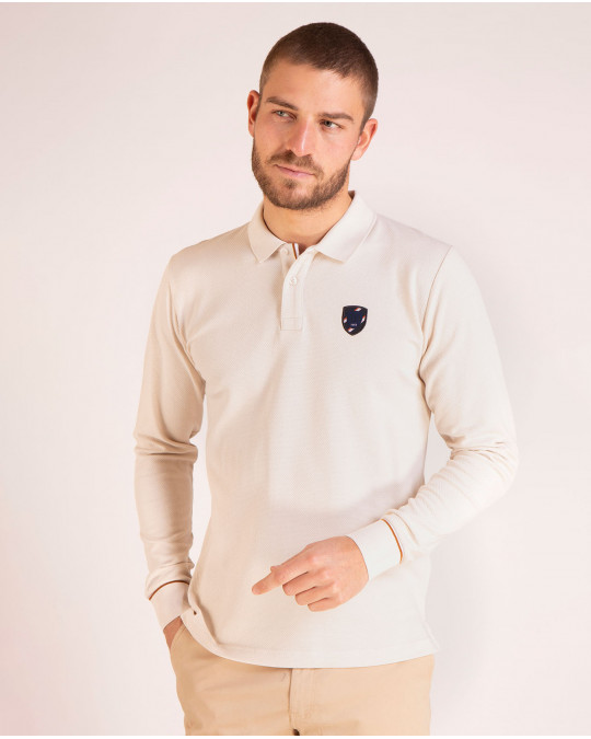 Polo manches longues avec écusson en maille cloquée
