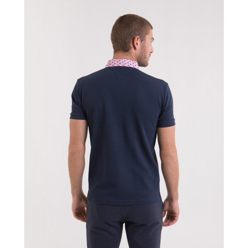 Polo uni en maille cloquée fantaisie