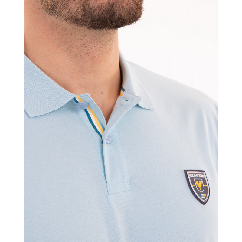 Polo manches courtes avec badge PVC poitrine