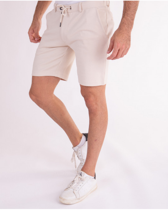 Short uni à taille élastique et cordon de serrage
